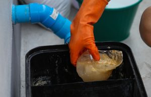 How to clean a grease trap.